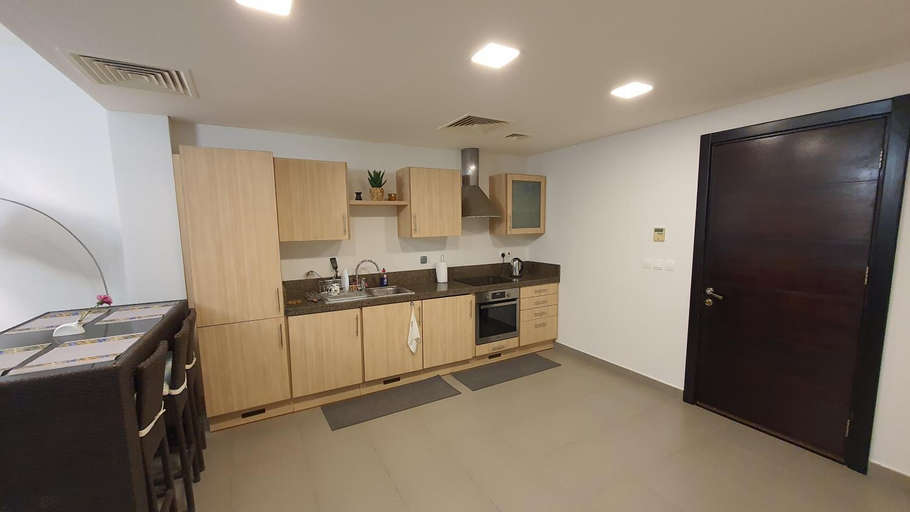 Kitchen, Comfy Stays Sea View Apartments at DeadSea Samarah Resort, Shooneh Janoobiyyeh