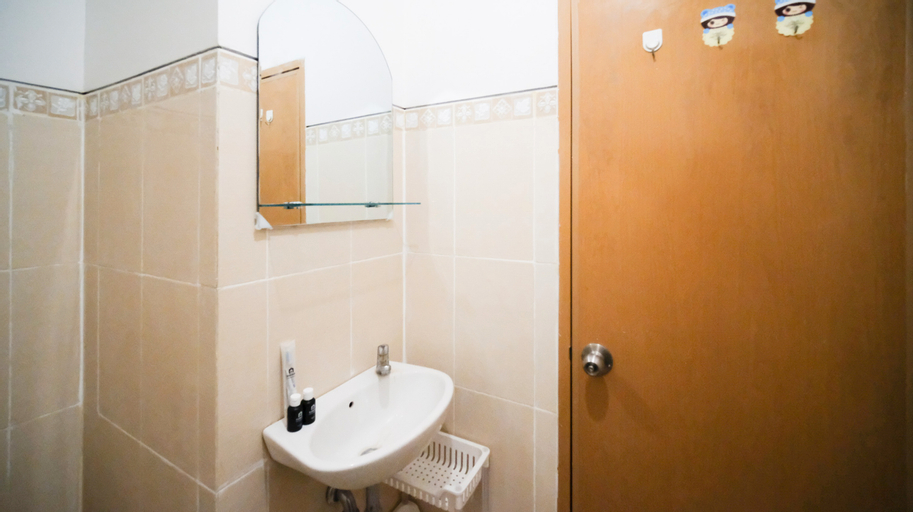 Bedroom 3, Best Choice and Cozy Living 2BR at Bale Hinggil Apartment By Travelio, Surabaya
