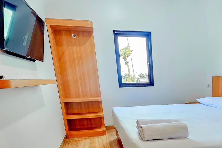 Hotel Buana Express RedPartner - Tap to explore photos