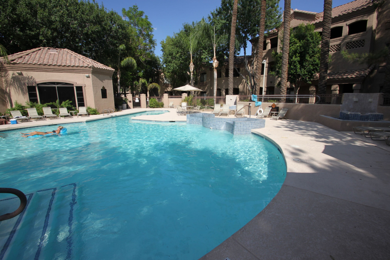 Outdoor pool 5, Signature 2 Bedroom Condo by RedAwning, Maricopa