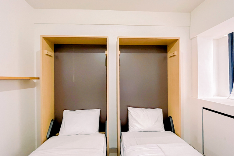 Bedroom 2, Modern Studio (No Kitchen) at Bandaraya - Tallasa City Makassar Apartment By Travelio, Makassar