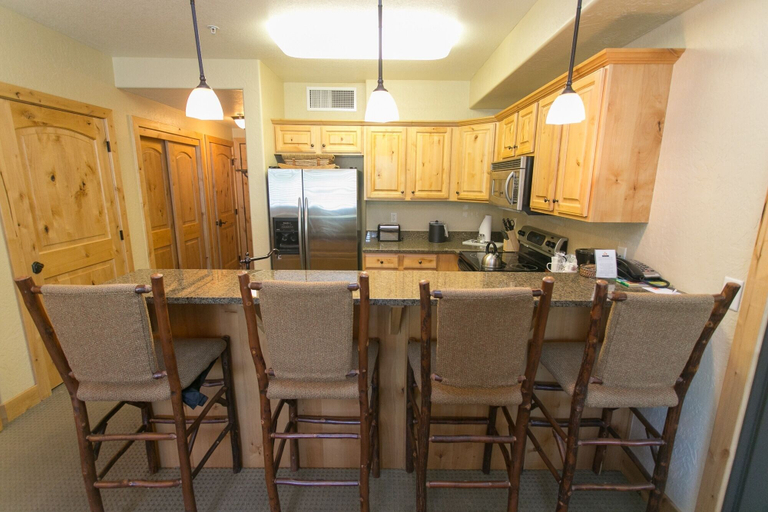 Private kitchen 5, Massive Condo with Views and Rustic Furnishings by RedAwning, Summit