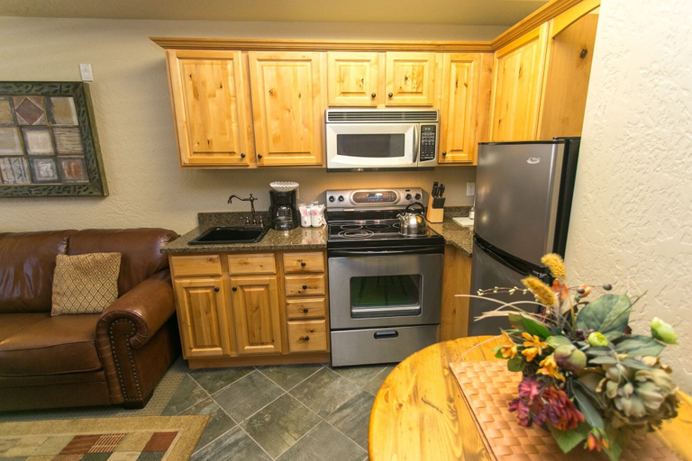 Private kitchen 2, Massive Condo with Views and Rustic Furnishings by RedAwning, Summit