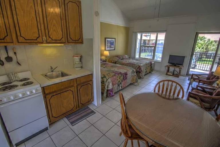 Private kitchen, Sandcastle 201b Minium Studio Bedroom Condo by RedAwning, Cameron