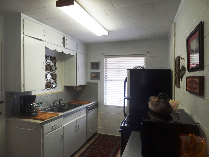 Private kitchen 2, Budget friendly queen studio with full kitchen, two queen beds and sleeper sofa by RedAwning, Montgomery