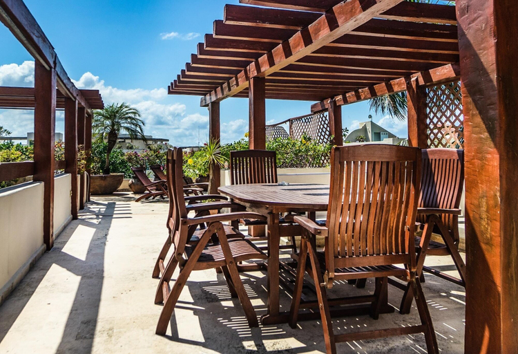 Outdoor dining 3, Royal Palms 10 2 Bedroom Condo by RedAwning, Cozumel