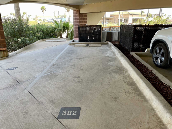 Parking, Laguna Bay 302n 3 Bedroom Condo by RedAwning, Cameron