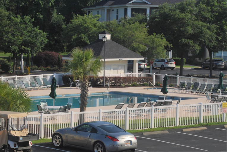Outdoor pool 4, Fairways At Riveroaks 23d 3 Bedroom Condo by RedAwning, Horry