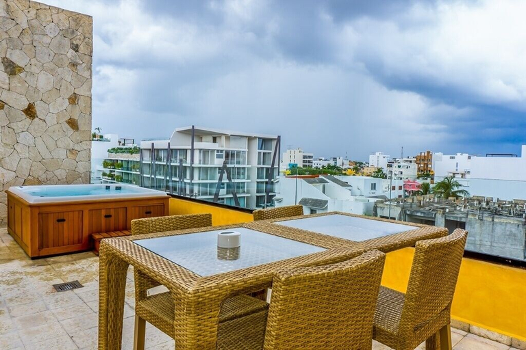 Outdoor dining, Lunada 314 Modern Playa del Carmen Condo with Tropical Garden View by RedAwning, Cozumel