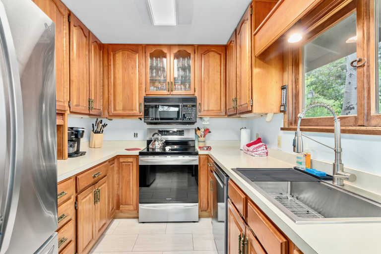 Private kitchen 3, Macmillan Dog-friendly Vacation At Windcliff 4 Bedroom Home by RedAwning, Larimer