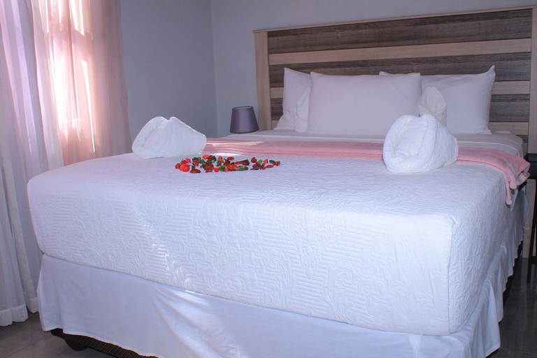 Bedroom 1, Serene Cottage, Masungu