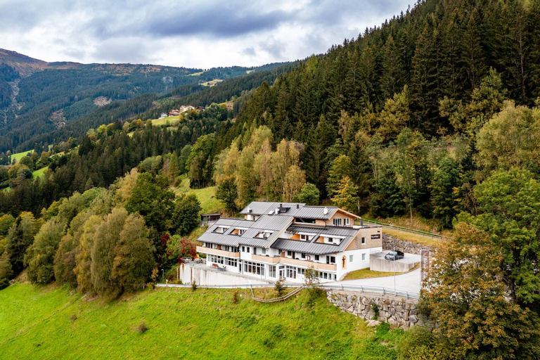 der Sonnberg Alpinlodges - Apartments mit Seeblick, privater Sauna und Self Check-In, Zell am See