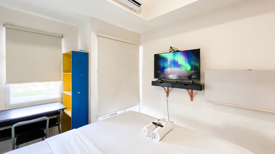 Bedroom 3, Simply Design Studio Apartment at Vida View Makassar By Travelio, Makassar