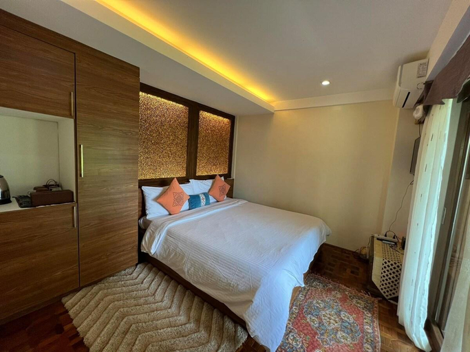 Bedroom 1, Chic Suite | Mountain View + Zen Room Access, Tagaytay City