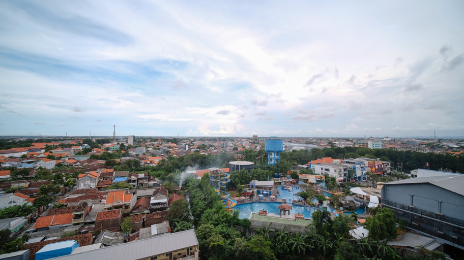 Exterior & Views, Well Furnished and Homey Studio (No Kitchen) Apartment at Suncity Residence By Travelio, Sidoarjo