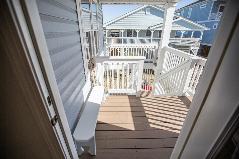 Balcony 3, Blue Crab Cottage 4 Bedroom Home by RedAwning, Brunswick