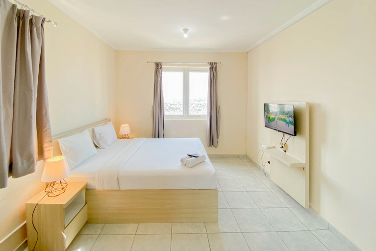 Bedroom 1, Comfort and Homey Studio Grand Palace Kemayoran Apartment By Travelio, Central Jakarta