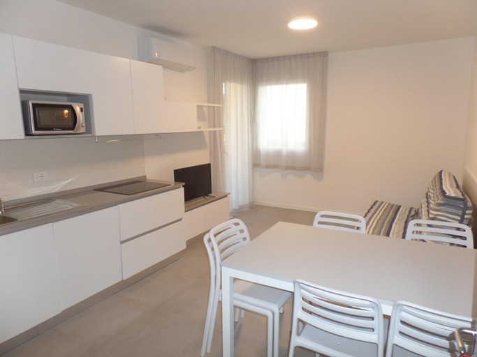 Room 4, Melograno A-c1 in Bibione, Venezia
