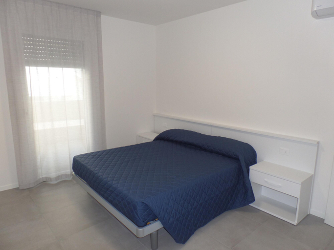 Room 3, Melograno A-c1 in Bibione, Venezia