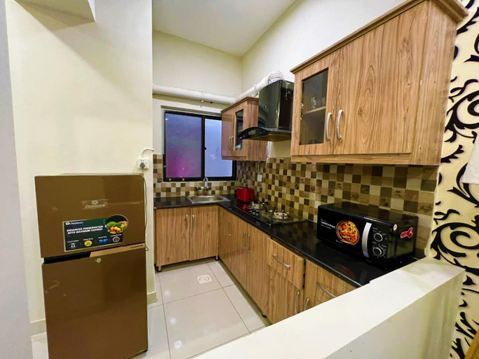 Private kitchen, the Realtors inn Luxurious 1bed Apartment dha 2, Islamabad