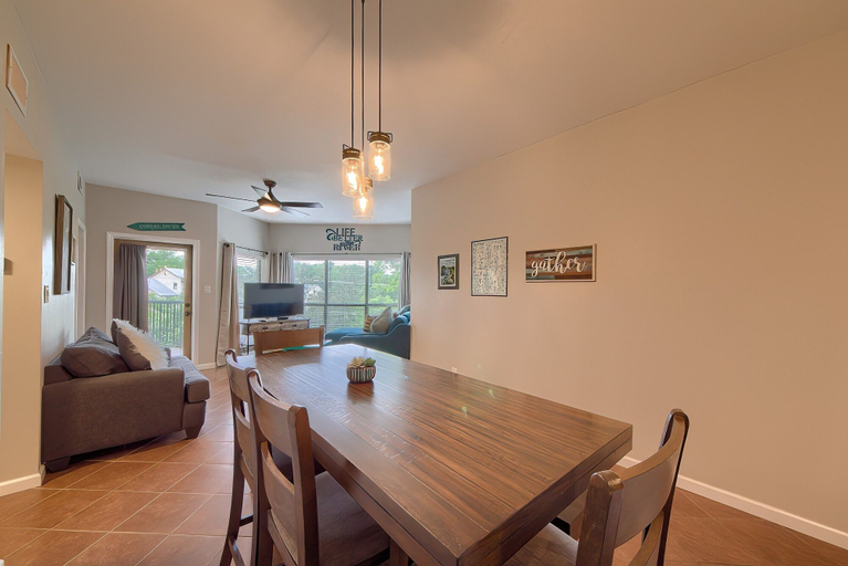 Dining 2, Inverness Condos #302 by RedAwning, Comal