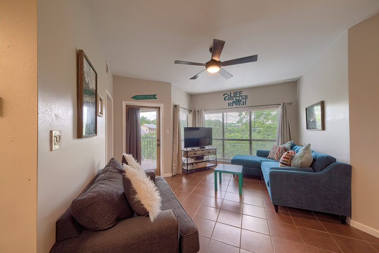 Living area 3, Inverness Condos #302 by RedAwning, Comal