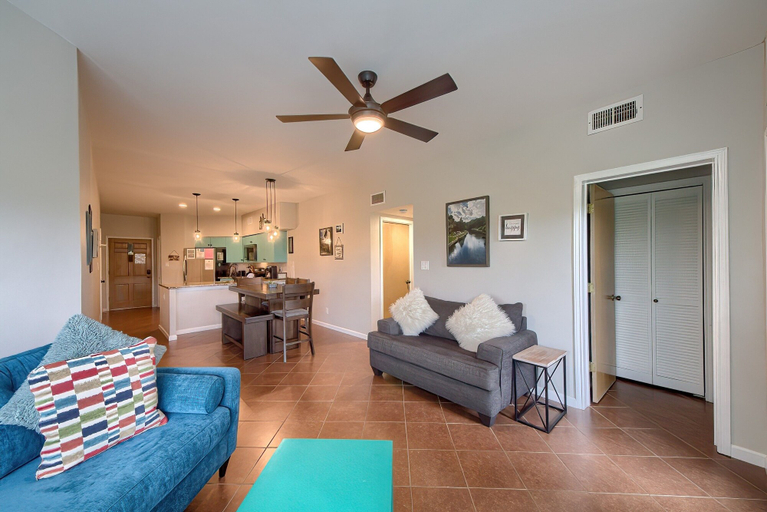 Living area 5, Inverness Condos #302 by RedAwning, Comal