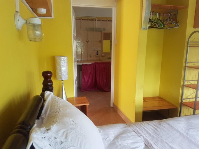 Bedroom 2, Coco Mango Suites