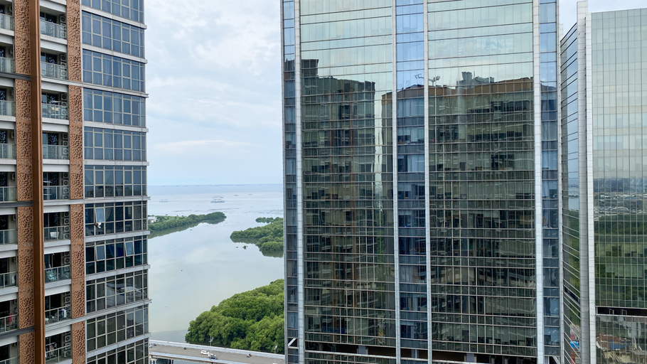 Exterior & Views, Serene and Best Location 2BR Gold Coast Apartment By Travelio, Jakarta Utara