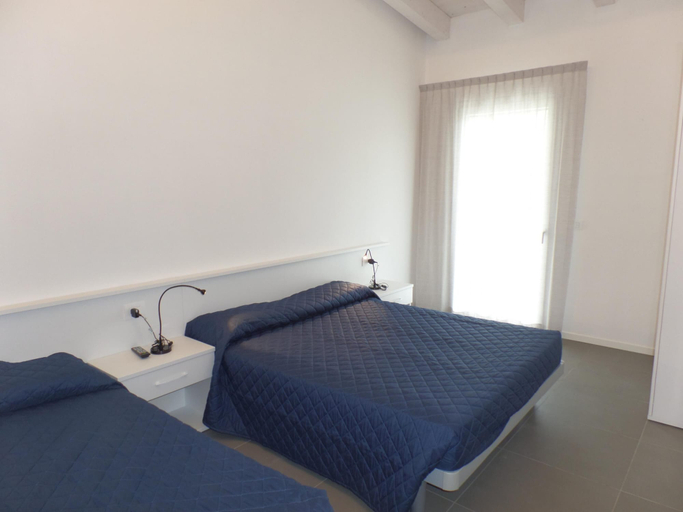 Room 4, Villa Onda D L in Bibione, Venezia