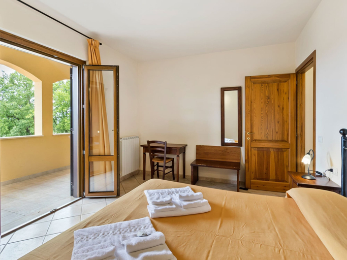 Bedroom 3, Belvilla by OYO Trilocale Giglio - Pianoterra, Grosseto