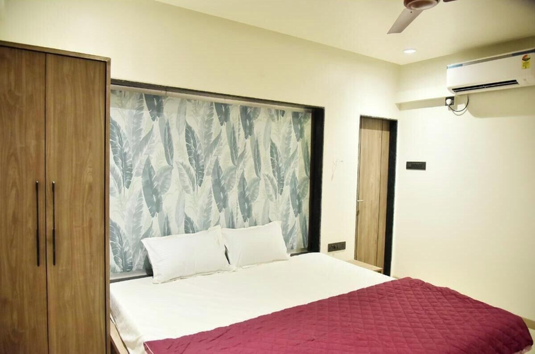 Bedroom 2, Hotel Manoranjan Enclave, Nashik