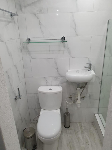 Bathroom 3, Devachan Apartments
