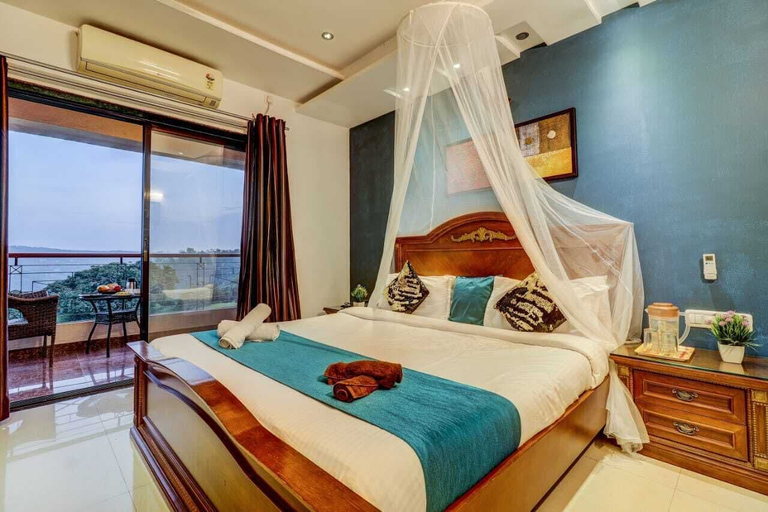 Bedroom 2, Mahinder Inn By Sapphire Stays, Satara