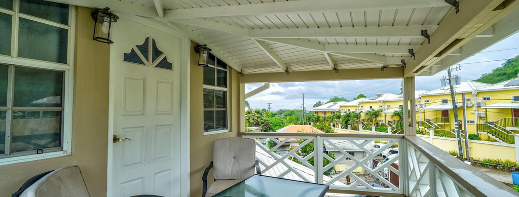 Balcony view, Your quaint home just steps from beach