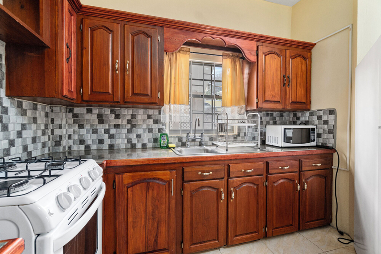 Private kitchen 2, Home at Dr Grooms Beach Road