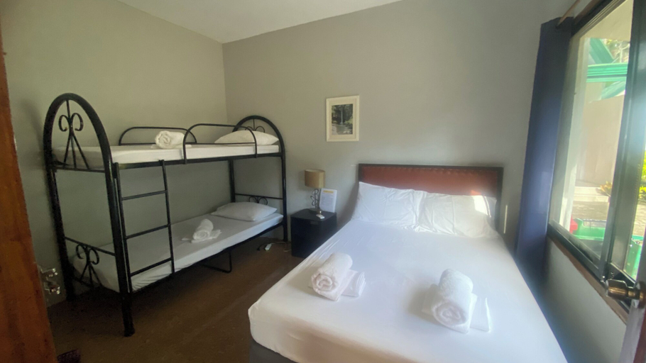 Bedroom 2, Seaside Travelers Inn by Camiguin Island Home, Catarman