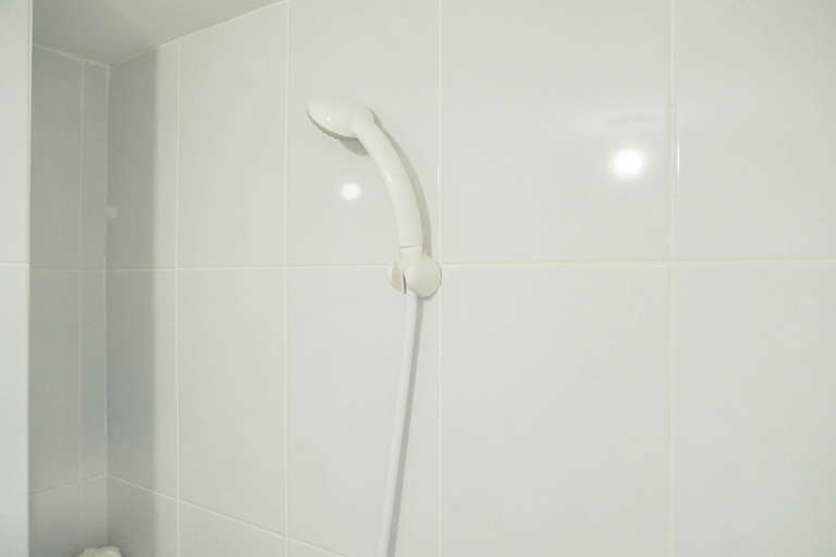 Bathroom 5, Good and Restful Studio at Tokyo Riverside PIK 2 Apartment By Travelio, Tangerang