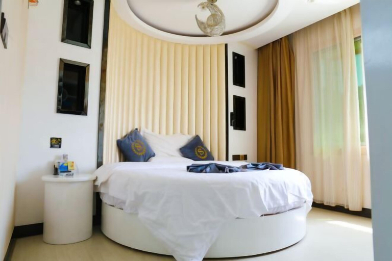 Bedroom 5, Jing Chen Holiday Hotel (Xilin Yingbin Road), Baise