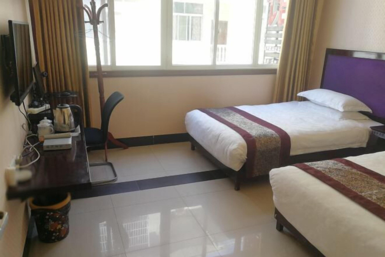 Bedroom 3, Zhongxinyuan Hotel, Enshi Tujia and Miao