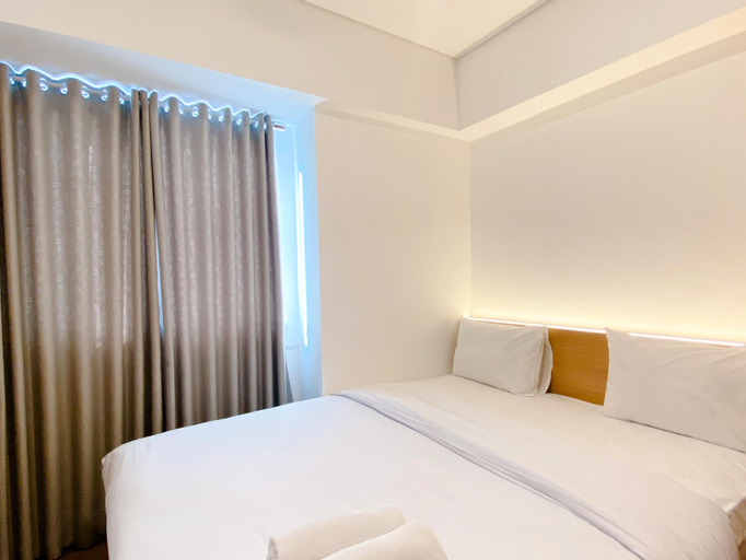 Spacious and Homey 2BR with Work Space at Meikarta Apartment By Travelio, Cikarang