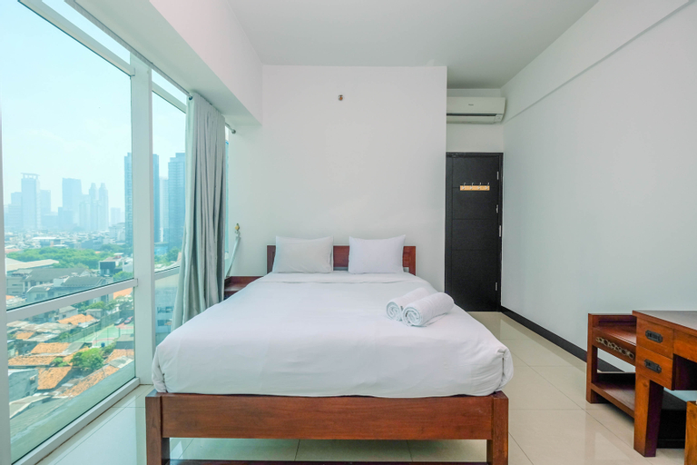Bedroom 1, Homey and Warm 1BR Apartment at Ambassade Kuningan By Travelio, South Jakarta
