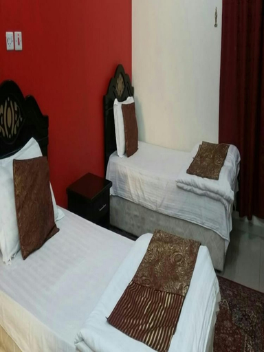Bedroom 2, Al Eairy Serviced Apartments Company 4