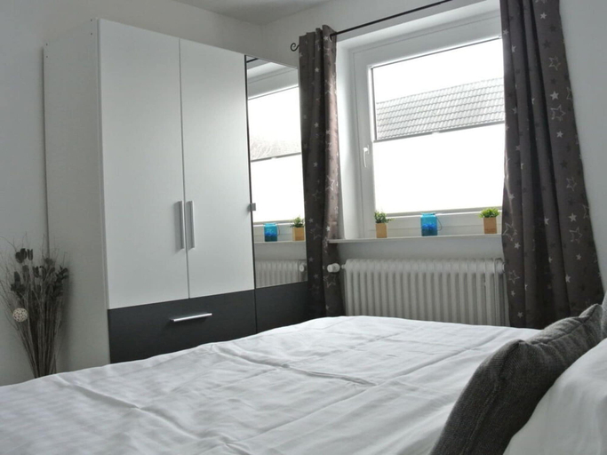 Bedroom 3, "norderney" in the Achter de Waterkant House, Dithmarschen