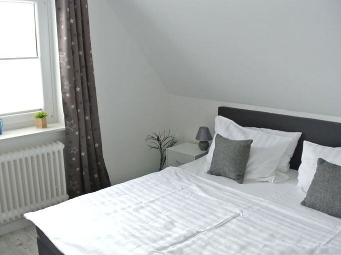 Bedroom 4, "norderney" in the Achter de Waterkant House, Dithmarschen