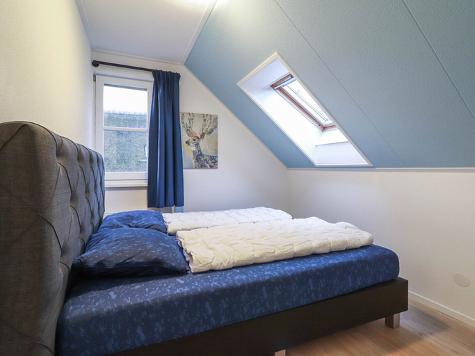 Bedroom 2, Spacious Villa in a Holiday Park in Makkum, Wûnseradiel