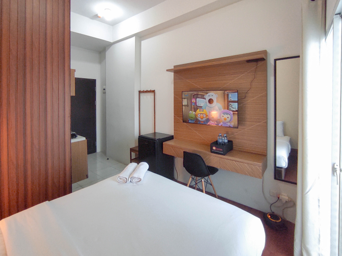 Bedroom 2, Homey Studio with Easy Pool Access Apartment at Suncity Residence By Travelio, Sidoarjo
