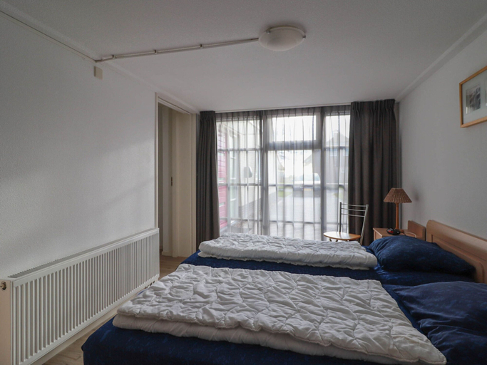 Bedroom 4, Spacious Villa in a Holiday Park in Makkum, Wûnseradiel