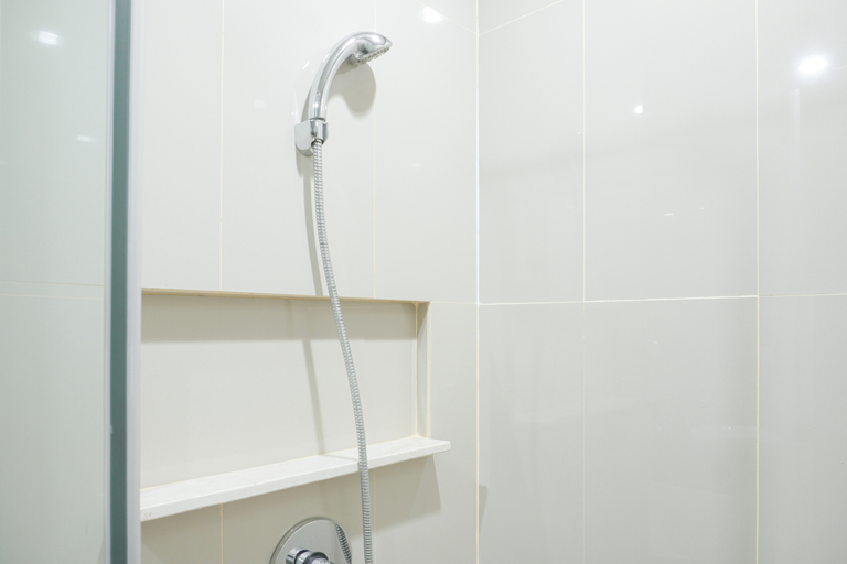 Bathroom 5, Exclusive and Spacious 2BR at St. Moritz Puri Apartment By Travelio, West Jakarta