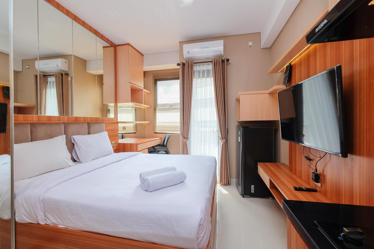 Bedroom 2, Nice and Fancy Studio Transpark Cibubur Apartment By Travelio, Depok
